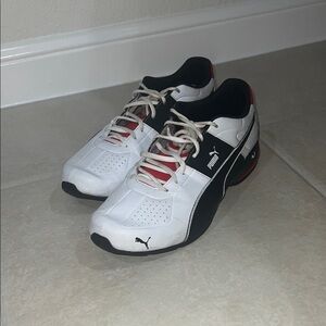 Puma Black and White Athletic Shoes with Red Highlights